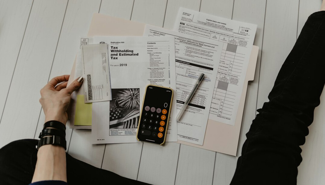 person reviewing budget spreadsheet