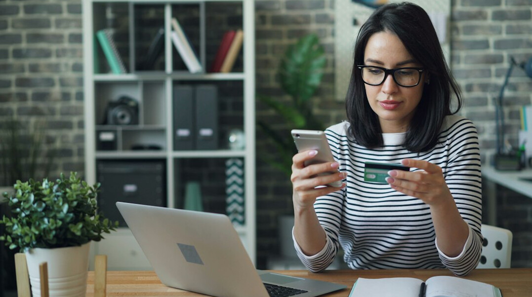 person paying bills online