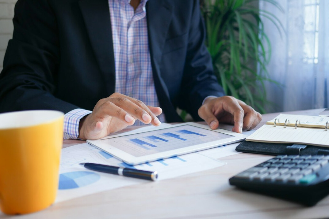 person reviewing budget spreadsheet
